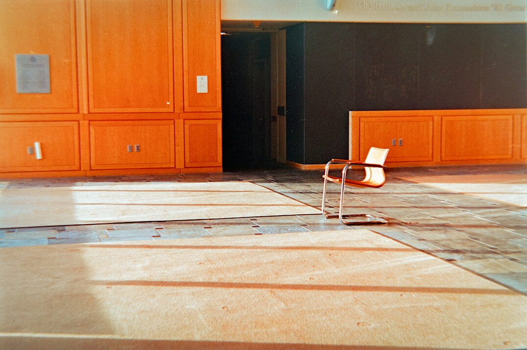 Empty television studio with cameras and lighting rig